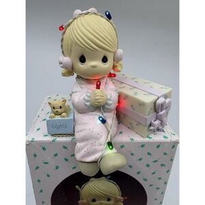 Precious moment girl holding lights with a cat Lights Up Battery Operated